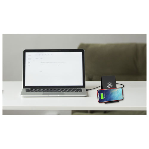 Working table with laptop, coffee and documents in home interior